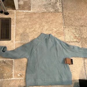 The North Face long sleeve chabot top never worn with tags.